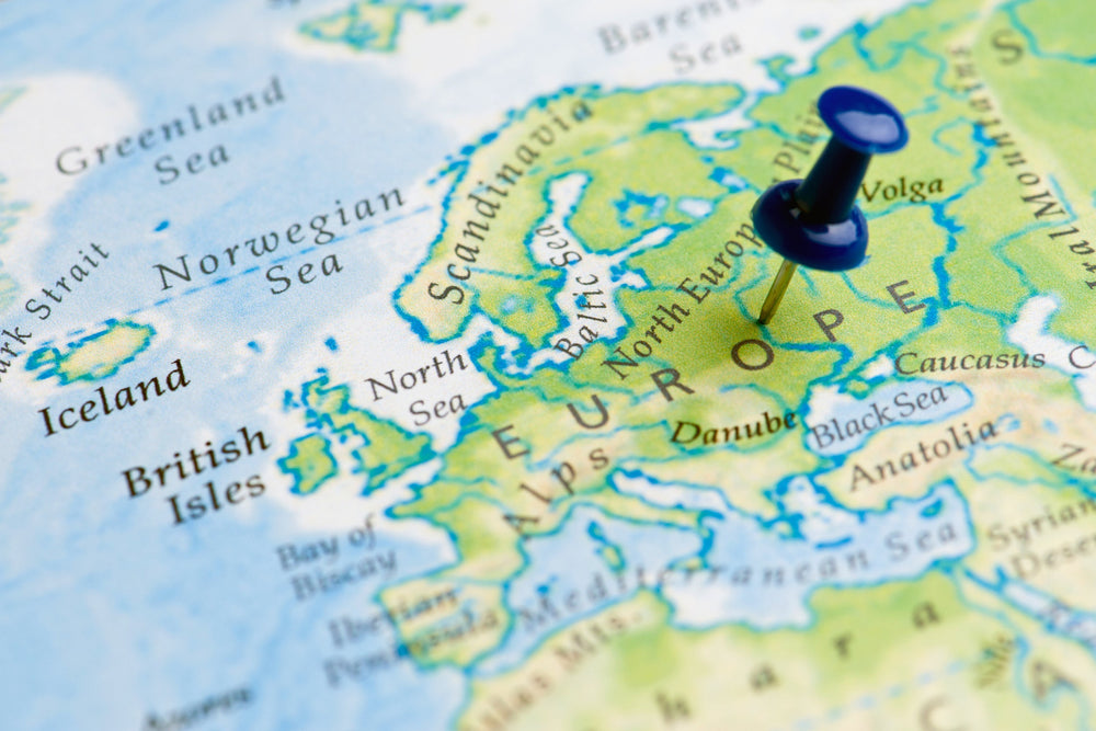 blue pin on map of europe